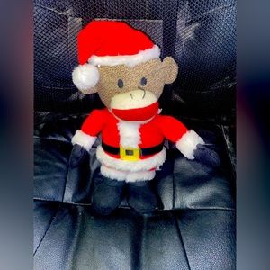2 Boyd’s Bears and a Christmas monkey that plays music and dances.